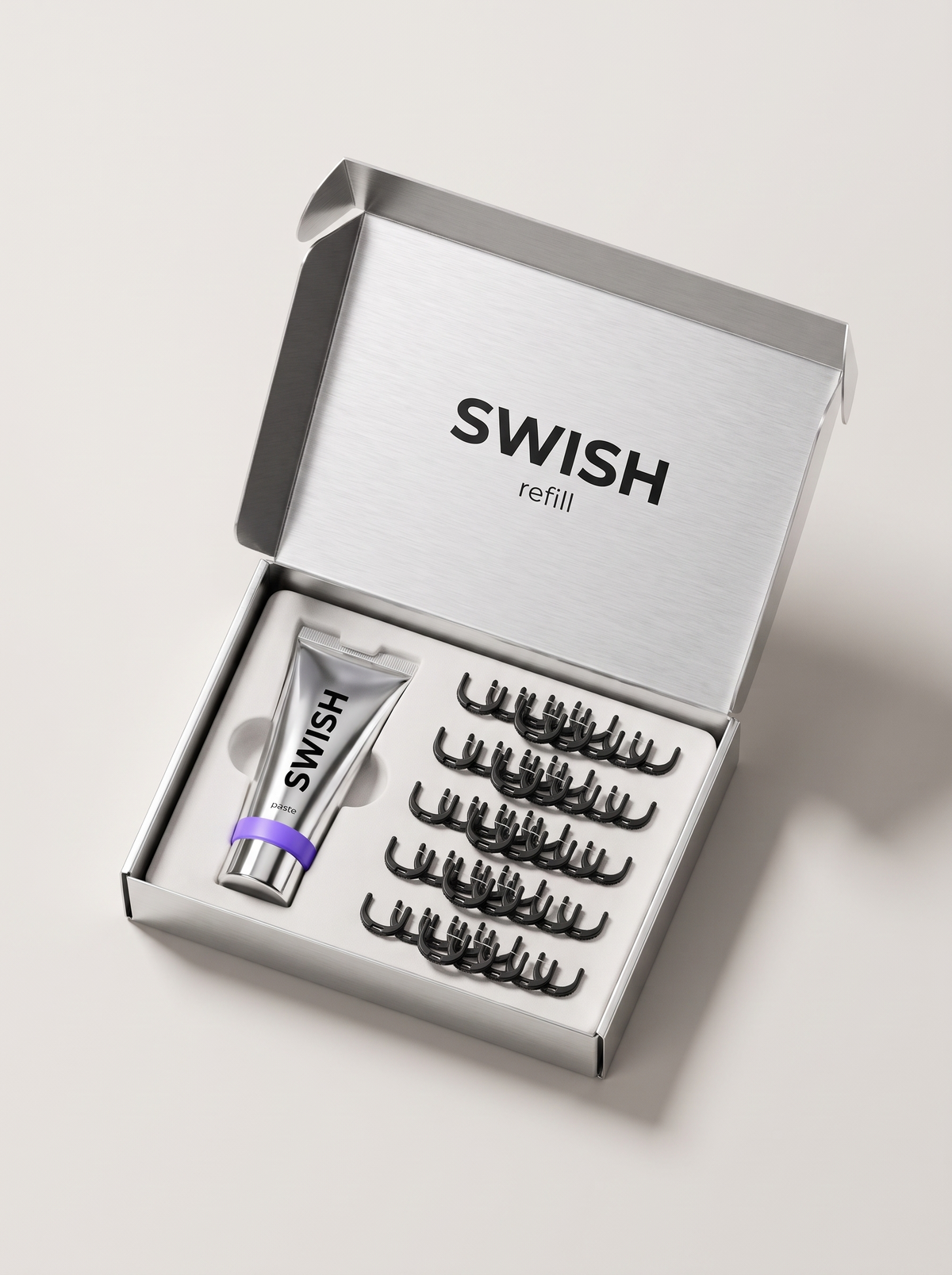 SWISH refill box with SWISH PASTE and floss tips